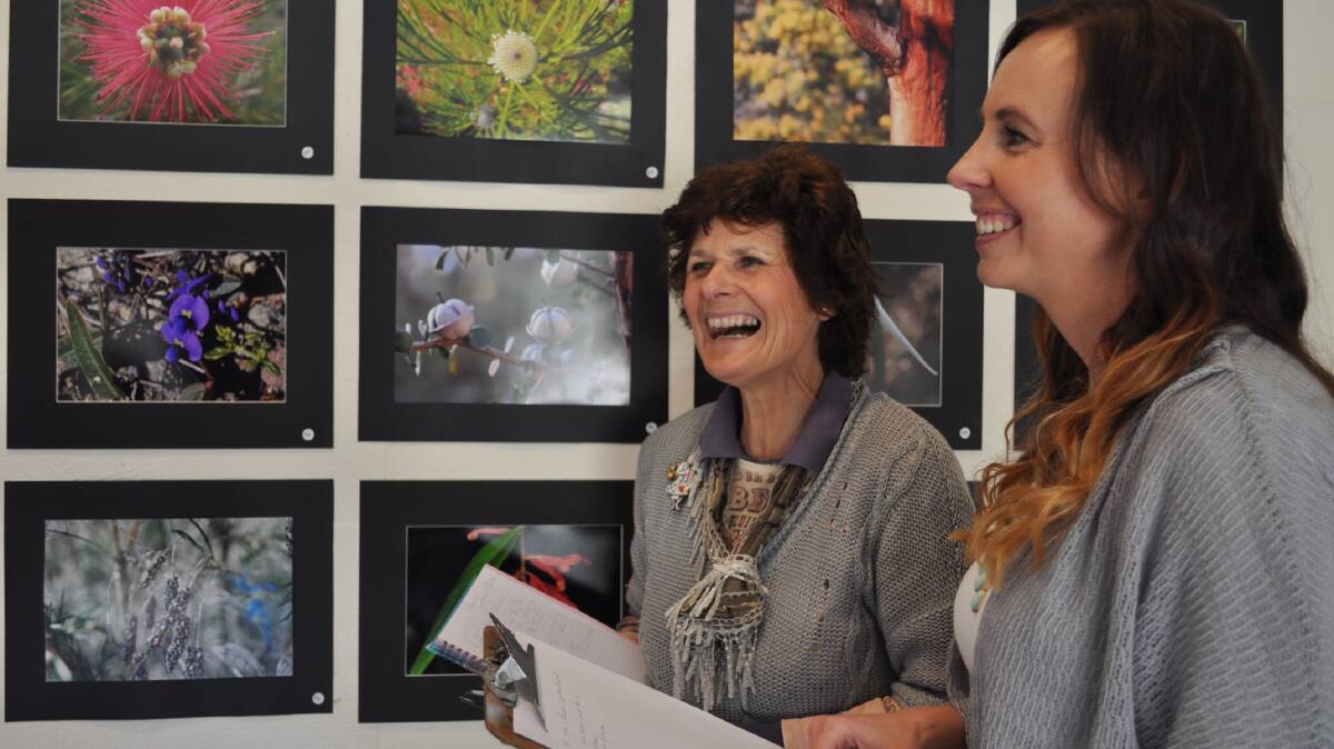 PICTURE PERFECT: Eurobodalla Regional Botanic Gardens photographic competition judges Krysia St Clair and Bianca Dopson selecting senior, junior and highly commended winners.