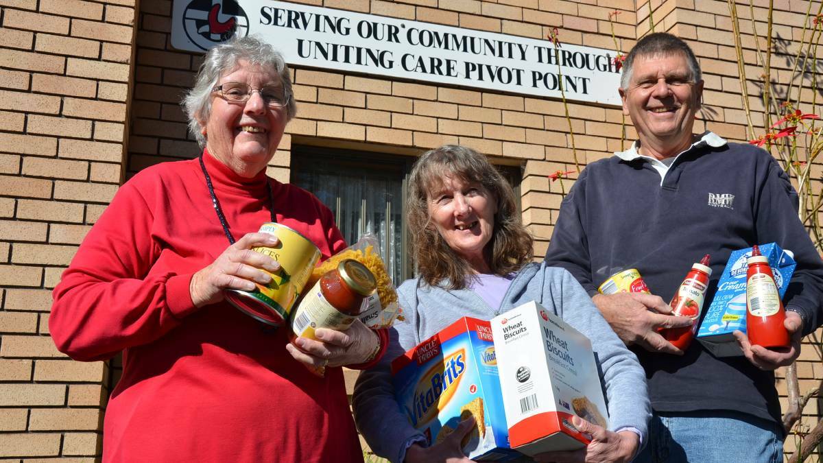 THEY’RE BACK: Pivot Point Community Outreach Centre board members Ruth Grace, Glenda White and Trevor Kohlhagen announced a trial return of the service, which supplies Batemans Bay residents with non-perishable grocery items and personal care items. The service will continue beyond the initial three-month trial depending on the level of support it attracts from the community. 
