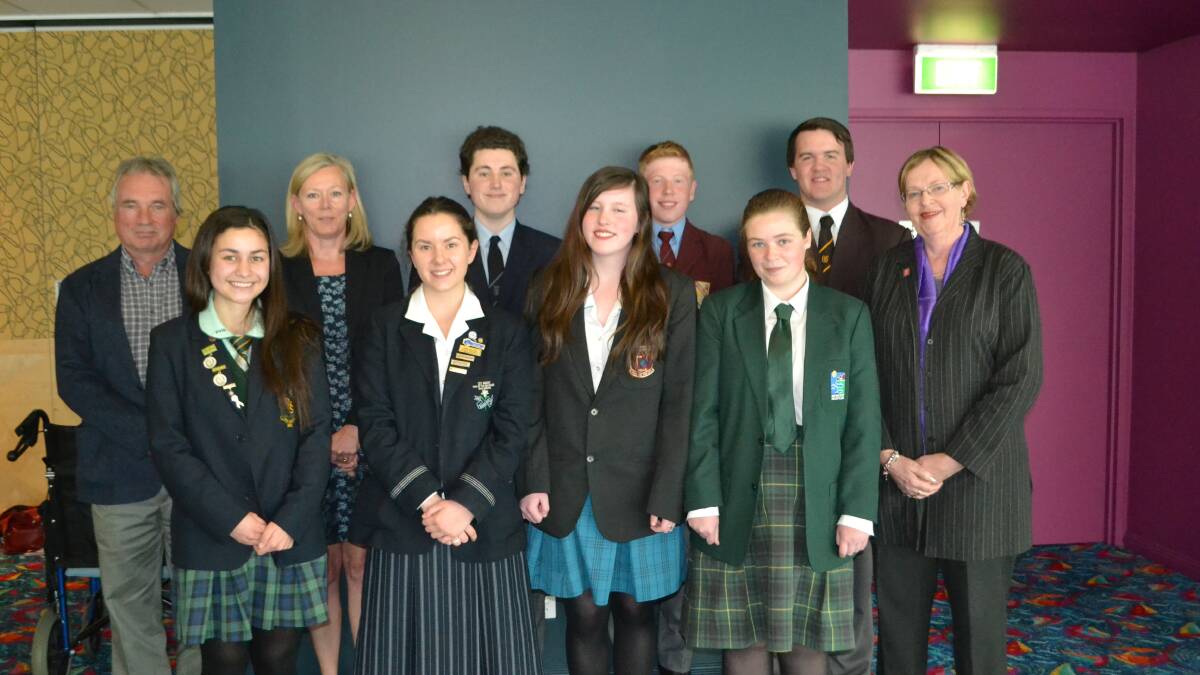 SHINING STUDENTS: (From back left) judges Bill Chilvers and Deb Bailey, contestants Glyn Megarrity, Edward Mulholland and Andrew Loomes, judge Vere Gray, winner Helaina Narvaiza, Victoria Sommerville, Rachael Short and Roslyn Love-Myers at the Quota student of the year competition 