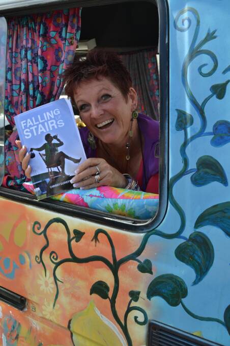 UPLIFTING: Author Chrissy Guinery will launch her first book, Falling Up Stairs, on September 27 after spending much of the past five years travelling with her husband Steve in their technicolour camper van. 