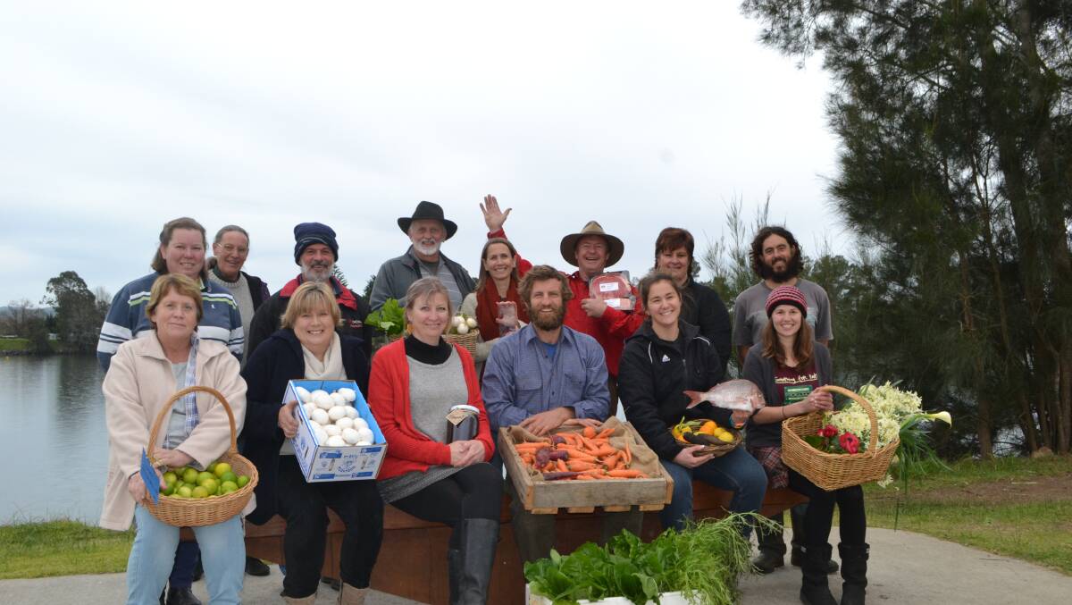 SAGE RESULT: SAGE committee members and stallholders celebrate being named Australia’s best farmers’ market yesterday 