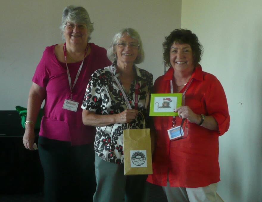 Meg Turner and Penny Young with Dianne Grigson, winner of EuroSCUG’s Christmas party raffle. 