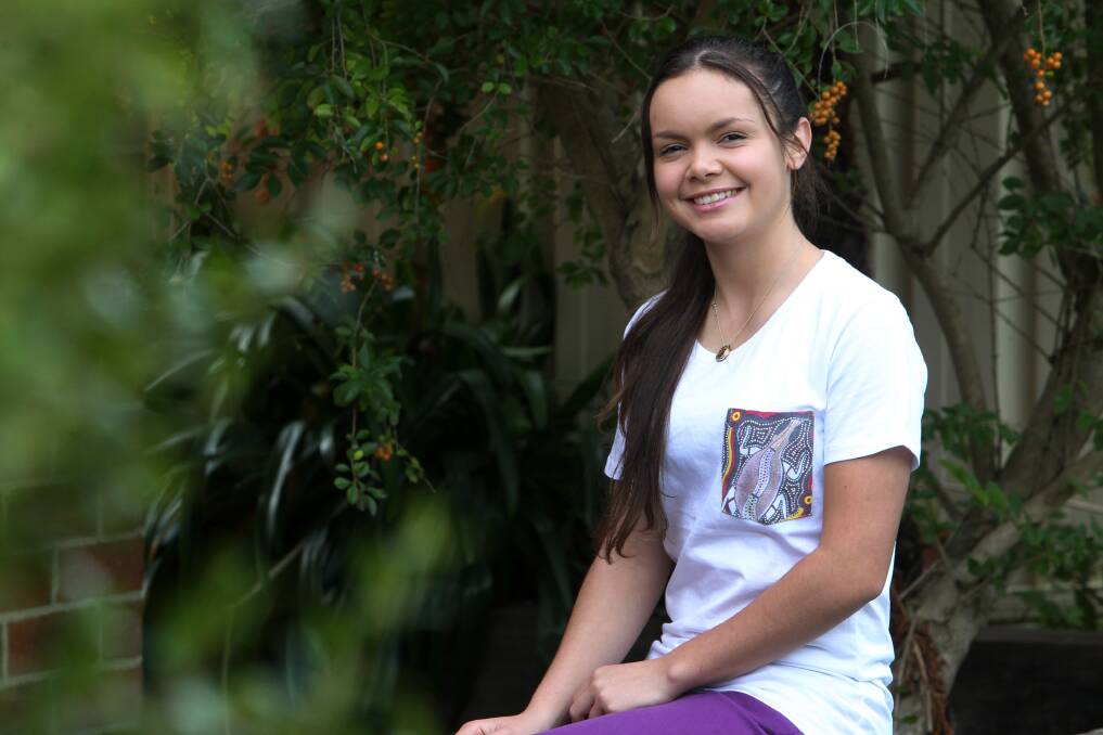 LIZARD LABEL: Rideika Wright’s design has been chosen for a charity T-shirt. The former Batemans Bay teen is full of praise for Indigenous mentoring group, AIME. 