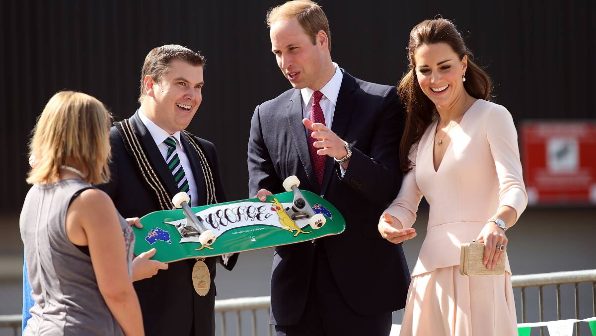 City of Playford Mayor, Glenn Docherty, presents a skateboard to Prince William, Duke of Cambridge and Catherine, Duchess of Cambridge. Photo: Getty Images