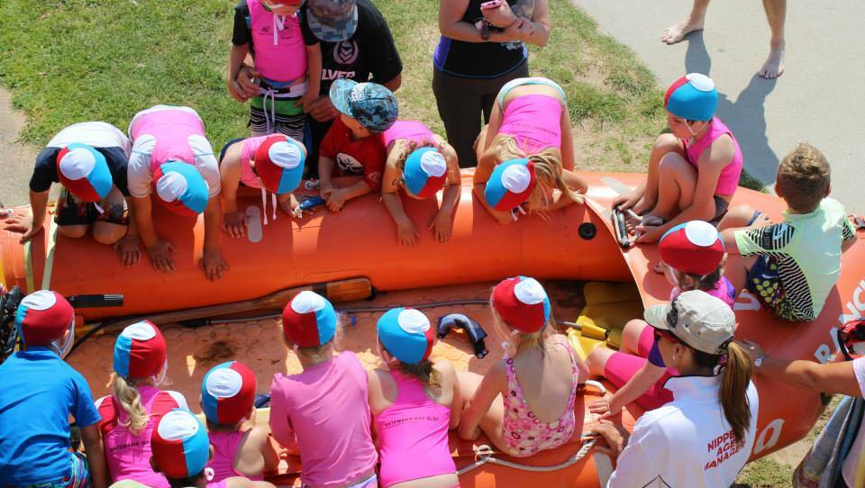 ALL ABOARD: Batemans Bay Nippers pile into a rubber ducky surf rescue boat last season. 