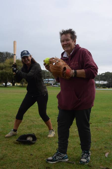 SWING AWAY: Marieke Janssen and Pam Williams are keen for softball to begin in Batemans Bay.
 