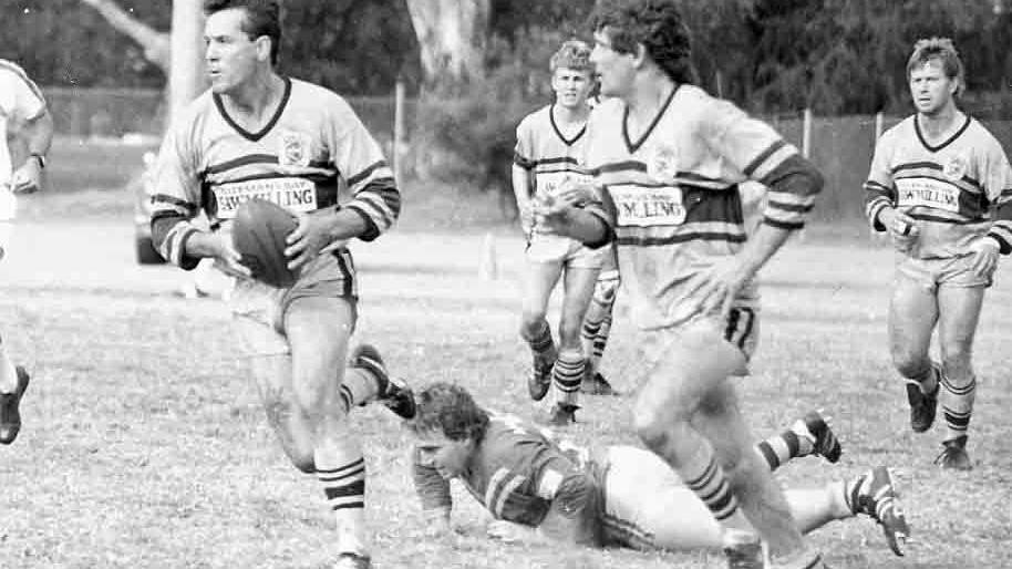 THROWBACK PHOTO: Jimmy Allen runs the ball forward for the Batemans Bay Tigers in 1986.