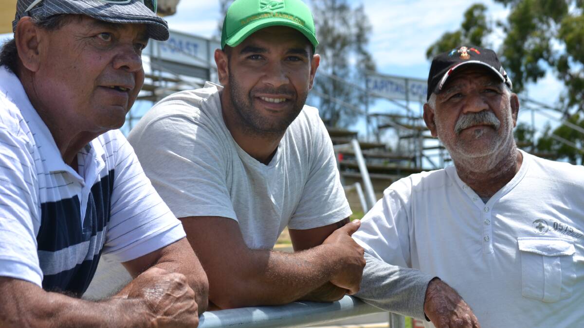 PAST AND PRESENT: South Coast United under 16s coach Harold Chatfield, player Mason Harrison and club president Alec Harrison want to bring the Koori Knockout to the South Coast.