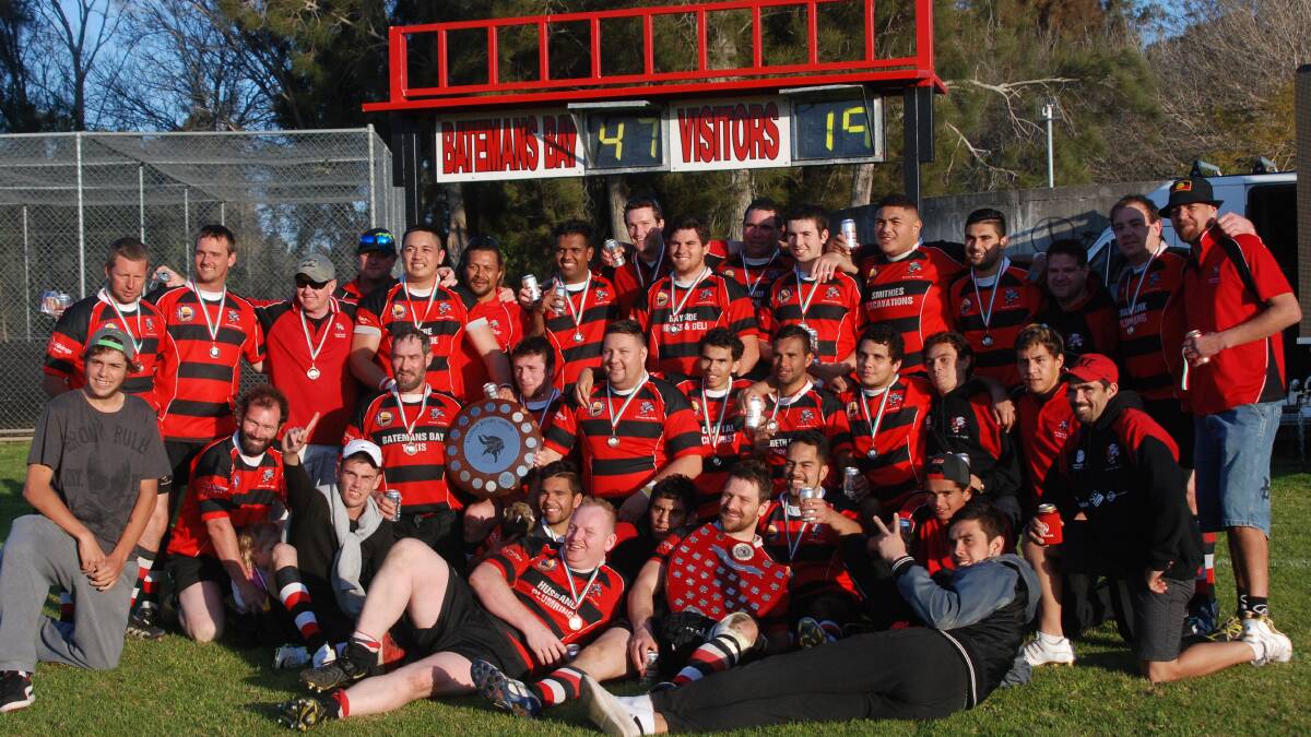 HAPPY BOARS: Batemans Bay Boars after winning the South Coast rugby union grand final at Hanging Rock on Saturday. 