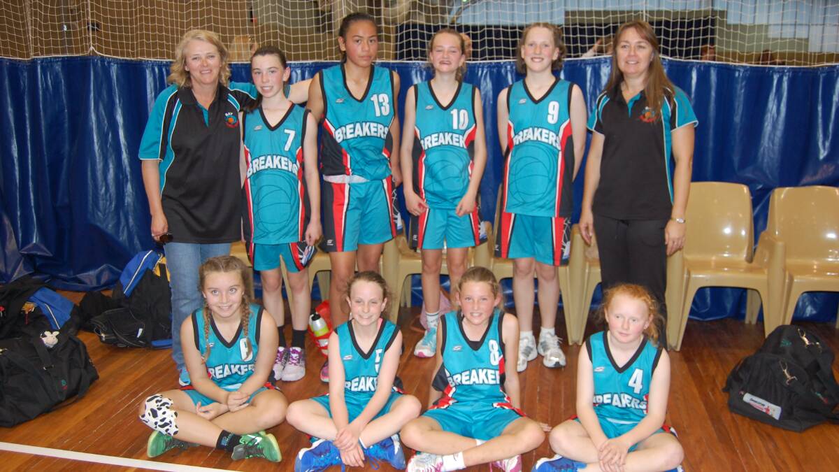 WILD CARDS: Bay Breakers under 14s team manager Michelle Blythe and coach Marine Crabb (back right) with players Jayde O’Shannessy, Dzhane Lole, Maggie Blythe, Amelia Berry, (front) Molly Elliott, Alexa Warwick, Kayla Beattie and Lucy Hanlon.