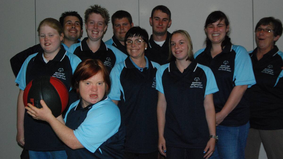 STATE REPRESENTATIVES: (Back, from left) Brett Bottle, Laurie Masterson, Craig Hropic-Mitchell, Madison Windley, Kathy Godwin, (middle) Heidi Jay, Reanna Hardy, Sharon Himan, Caitlin Blay and (front) Liz Godwin are ready to compete against Australia’s best Special Olympians next week. 