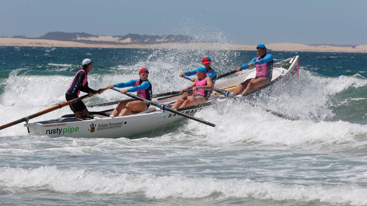 CUTTING THROUGH: Batemans Bay’s under 19s men’s crew, pictured last season at Stockton, will hit the waves at Malua Bay on Sunday. 