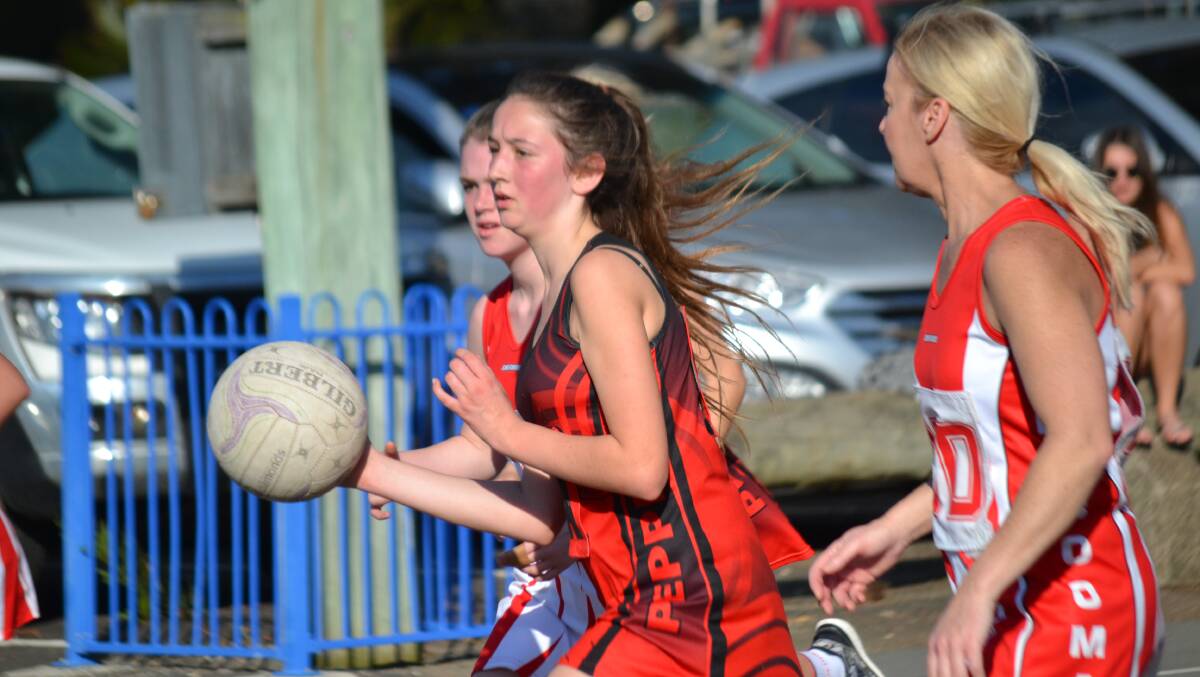 QUICK PASS: Hot Chilli Peppers player Abby Hillyar and her team mates face Narooma Ninjas in the senior B grand final tomorrow.
 
