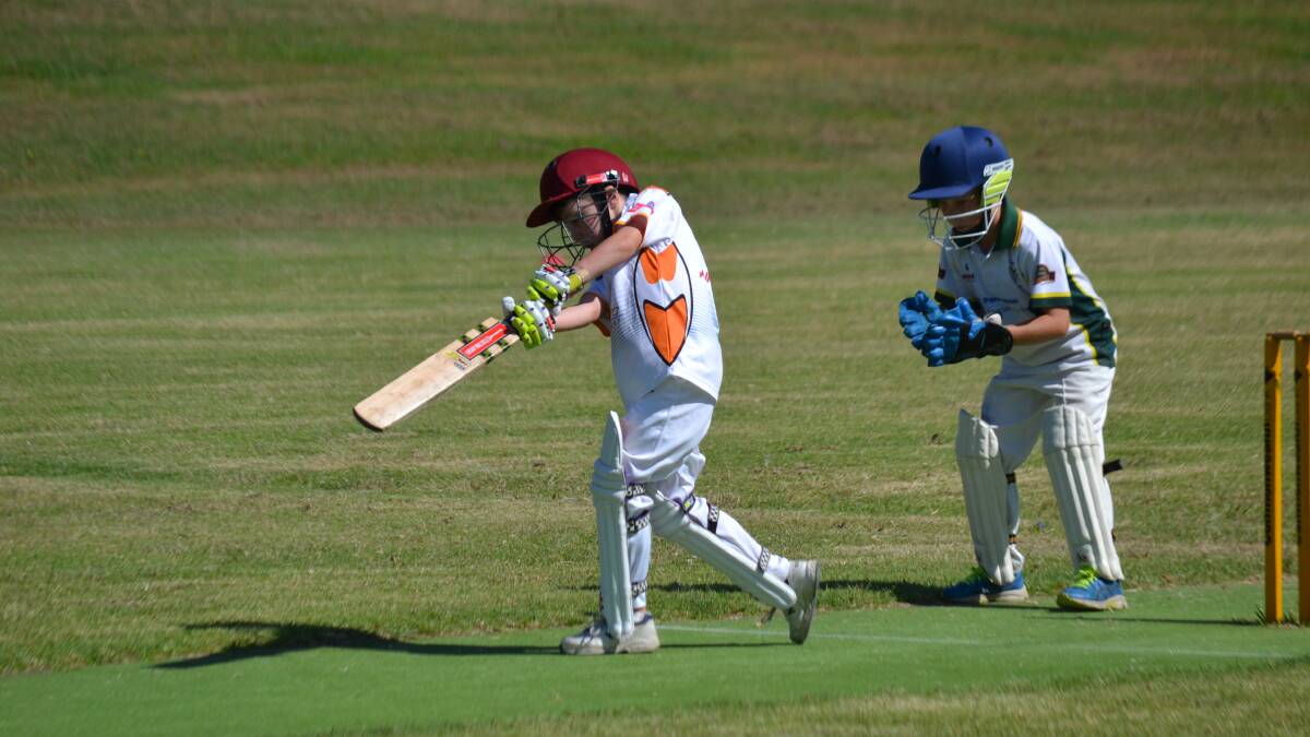 MIDDLED IT: Batemans Bay’s Oscar Woolridge plays a drive while Shoalhaven Ex-Servicemen’s Tim Hopkins looks on at wicketkeeper. 
