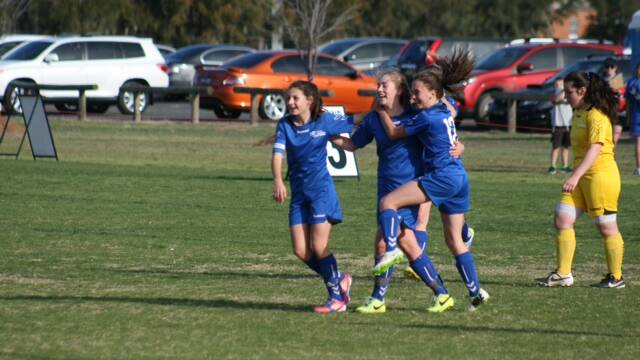 GOOD TIMES: Southern’s under 14s celebrate scoring at the state titles at Mudgee. 