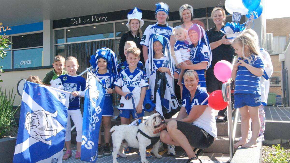 BULLDOG ARMY: (Not in order) Lachlan King, William Taylor, Evie Taylor, Macey Forrest, Emily King, Samuel Taylor, Brittney Heron, Emily Funnell, Kye Forrest, Belinda Forrest, Millie Forrest, Angela Funnell, Danielle Heron and Arnold show their blue and white stripes. 