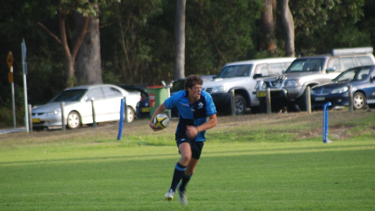 FULL SPEED: Chris Smithers counter attacks from fullback for Broulee. 
