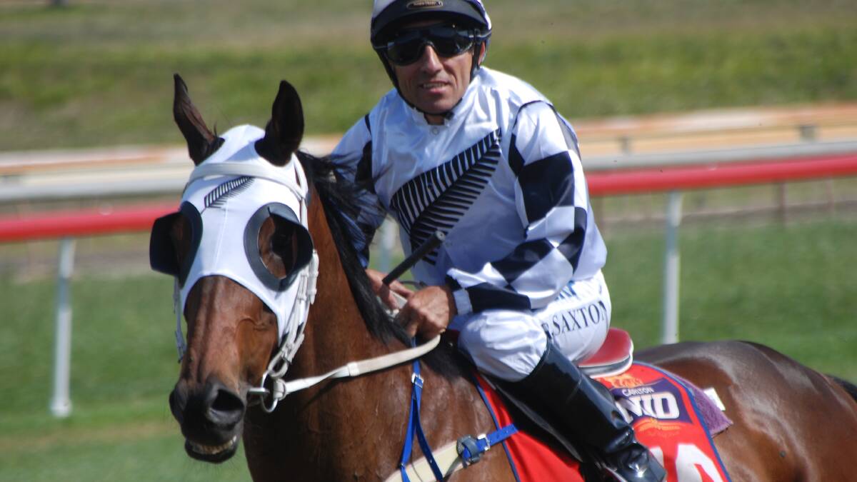 WINNERS' WALK: Roly Saxton aboard Lighthouse after a race win at Moruya in November. 