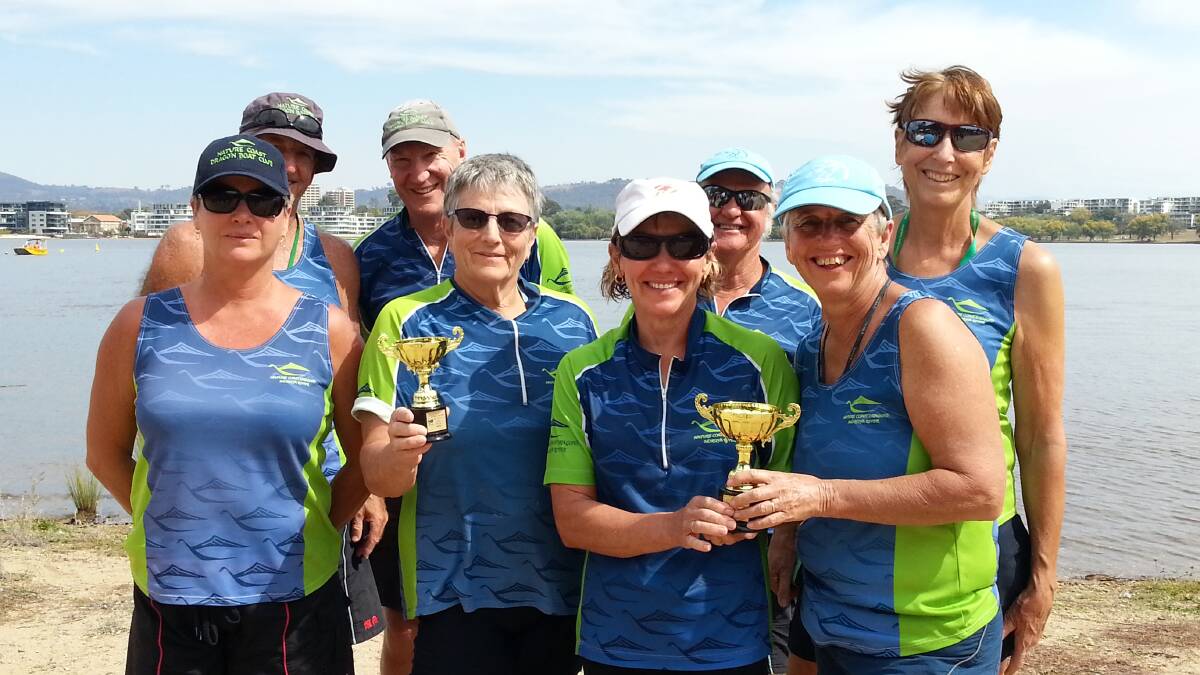PROUD AS PUNCH: Nature Coast Dragon Boat club members Lee Wellham, Dave Wellham, John Holgate, Carolyn Lean, Therese Holgate, Nev Britton, Marian Matti and Cathy Smith.