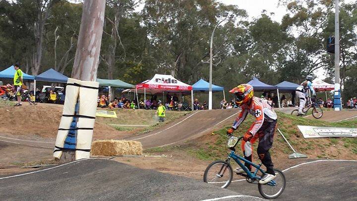 IN FRONT: Ben Williams races round the Castle Hill BMX course. 