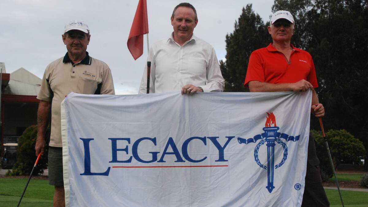 GOOD CAUSE: Legacy members Brad Avis and Keith Brewster flank major sponsor Allan Rutherford to promote the charity golf day at the Catalina Country Club. 