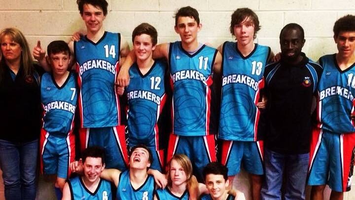 UNDEFEATED: Bay Breakers under 16s boys’ team manager Carolyn Harding and coach Kojo Osei-Agyeman (back, second from right) and players (back, from left) Darcy Rankin, Riley O’Shannessy, Sam Jackson, Jeremy Harding, Blayne Abela, Zac Southwell, (front) Harry O’Keeffe, James Gunson, Riley Van Dyk and Lockie Armstrong.