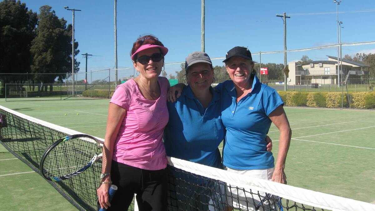 TAKING SERVE: Tomakin’s Lorna Jackson and Bay Rockets’ Robyn and Ann Cole at the Batemans Bay Tennis Club.