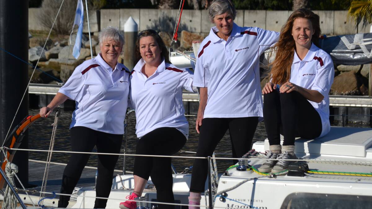 ALL ON DECK: Debbie Cockle, Lara Phillips, Jane Elek and Grace Allington wait at the jetty before heading out for a Batemans Bay Sailing Club race. 