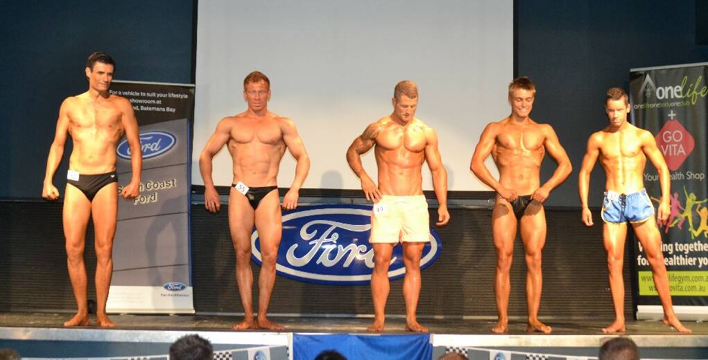 Justin Bell (centre) with Lachlan Korman (right) in the men's winners' category. 