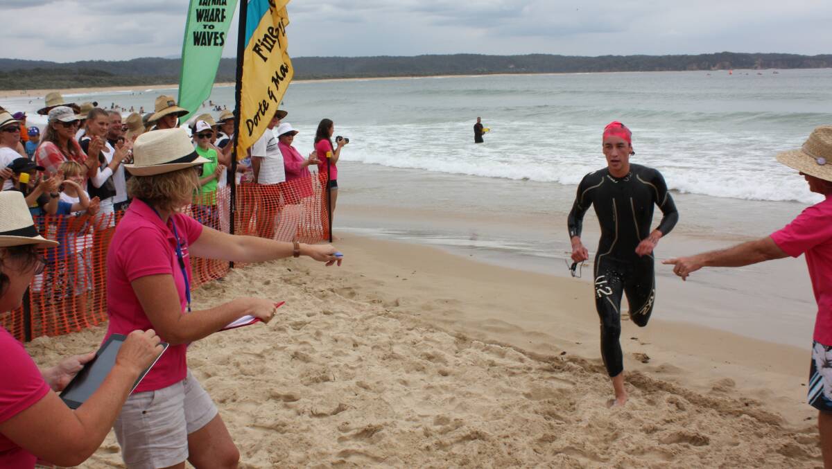 TATHRA: James Macri from Melbourne cruises to victory in the 1200-metre Wharf to Waves Splash for Cash at Tathra. 