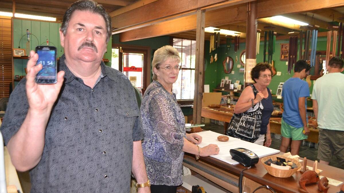 TILBA: Running a business and serving tourists is made that much harder without any mobile service, according to Central Tilba business owners George and Barbara Davies, pictured in their shop Tilba Woodturning Gallery. 