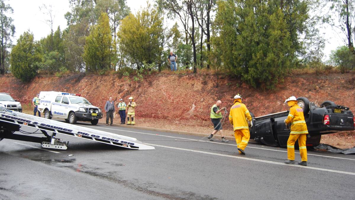 MERIMBULA: Lucky escape for man suspended by seatbelt in this accident on Sapphire Coast Drive, Merimbula. 