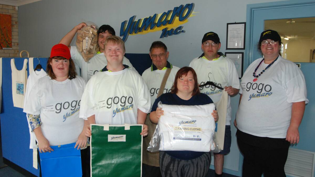 MORUYA: Yumaro Industries is opening an online shop in a bid to increase its profile and offer sustainable employment. Pictured is employees Amy Lockton, Michael Kachyckyj, Bradley West-Neuman, Lizzie Godwin, Peter Magnus, James Gillett and Jodie Hanson with some of the products to be made available on the eBay store, go go Yumaro. 