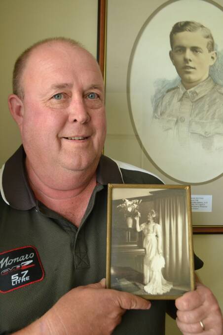 Richard Strong with a photo of his great aunt Nita McLean, probably taken in 1914. 