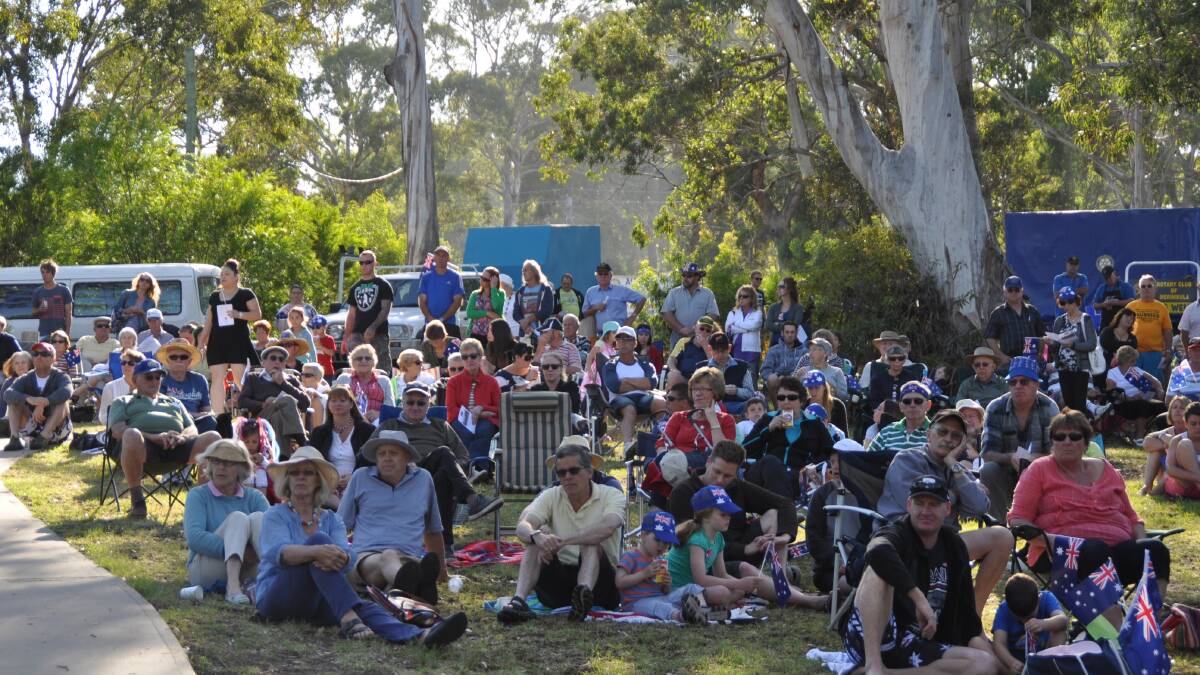 MERIMBULA: Part of the big crowd at the Merimbula Australia Day celebrations hosted by the Rotary Club of Merimbula in Rotary Park. 