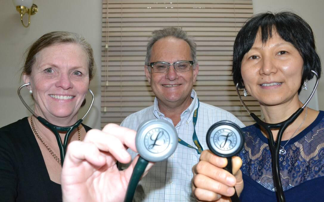 ULLADULLA: Former Milton pharmacist Amanda Venables and Lian Zhao have started work at the Milton Medical Centre under the guidance of Dr Brett Thomson (centre) and other staff, as part of an Australian Government program training rural doctors. 