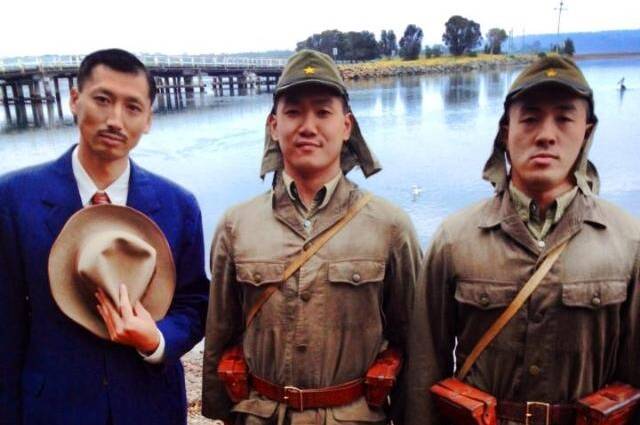 BERMAGUI: The actors playing Japanese soldiers and an official looking very authentic at the Wallaga Lake bridge on Monday for the filming of the Angelina Jolie film “Unbroken”.
 