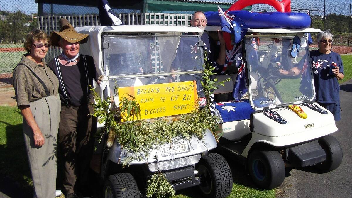 BERMAGUI: The best decorated cart winners at Bermagui Country Club on Australia Day; from left Marion and Barry Bowling on a "Gold Mining" theme and Brian and Dawn Kenyon with their "Aussie Surfer" theme. 