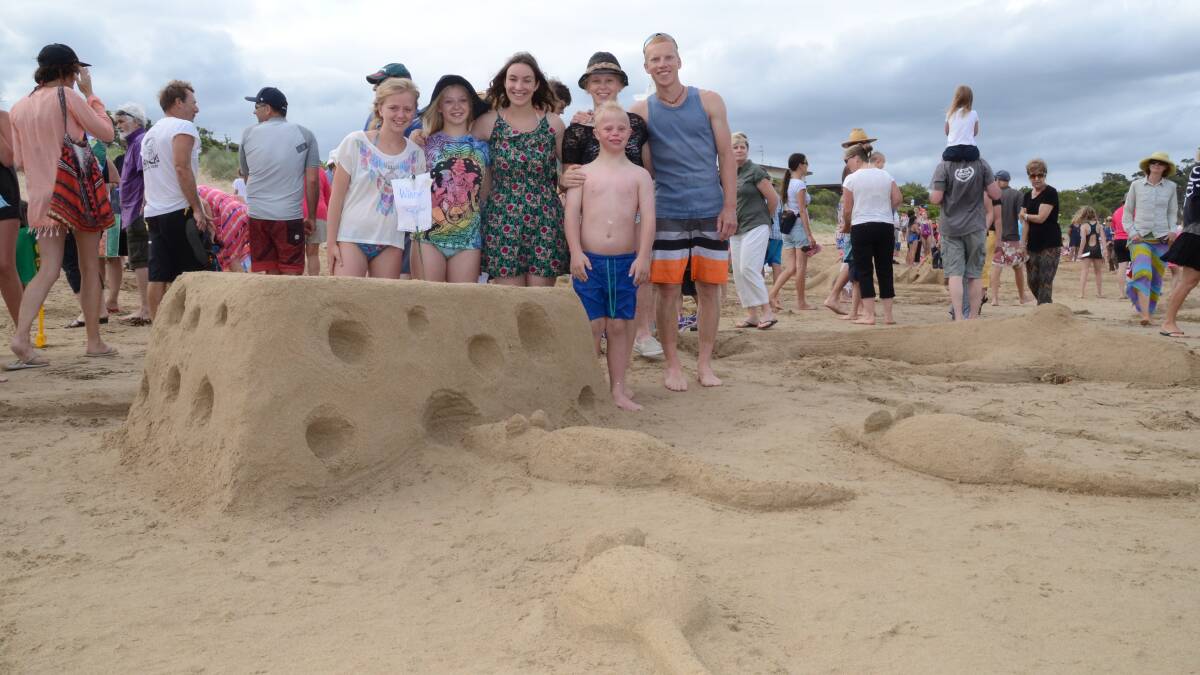 BROULEE: Canberra's Lillie and Annie Kruger, Julia Shumaker, Heidi Kruger, Amos Findlay and Jack Kruger had a win on New Year's Eve with their sand creation ‘Three Blind Mice’. The sculpture won the 2013 Broulee Sand Modelling and Sand Castle Competition at North Broulee Beach. 