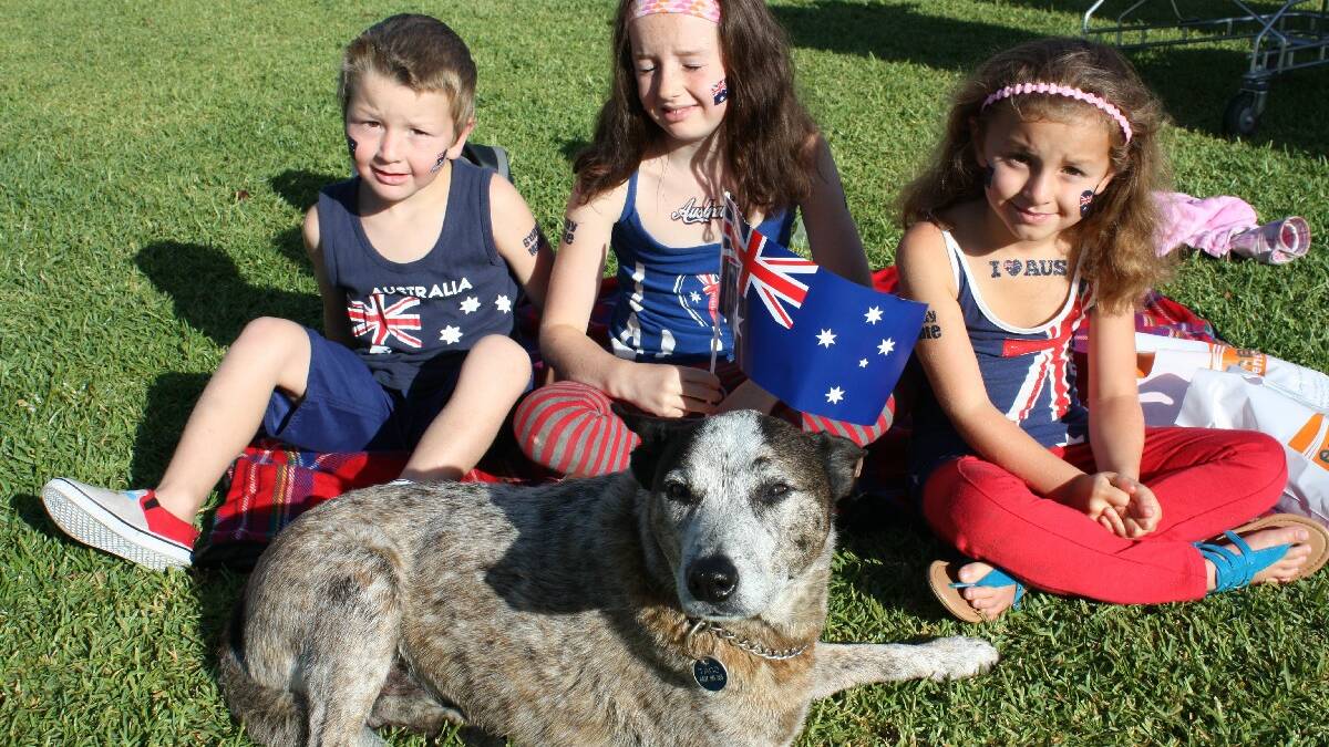 BEGA: Hayden, Laila and Grace Lee of Bega, with Taco the blue heeler, take part in Bega’s Australia Day celebrations. 