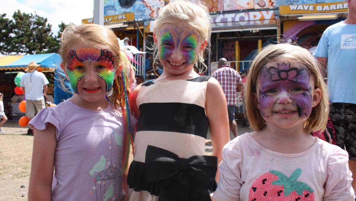 BERMAGUI: Enjoying the sights and sounds of the Bermagui Seaside Fair are (from left) Lucia Battye, Lucy Whalan and Sophie Whalan. 