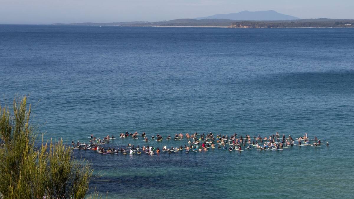 A large crowd of surfers turned up at South Broulee on March 15 to farewell surfing legend Deano Cristallo. PHOTOS: JOHN HICKS