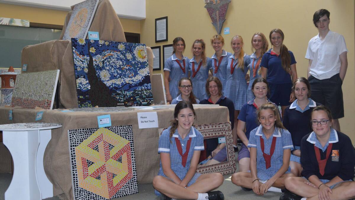 PAMBULA: Lumen Christi Catholic College visual arts year 9/10 students and their creative and colourful mosaics. 