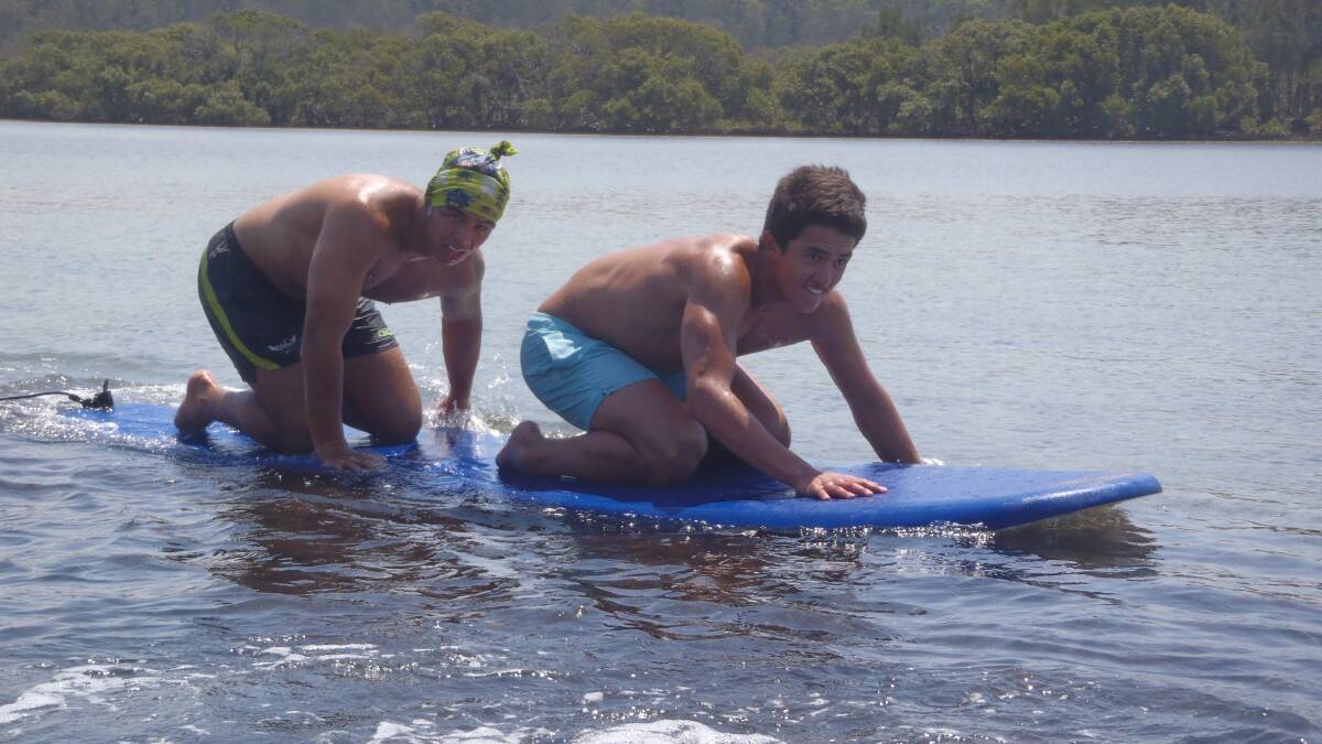 Canberra Raiders rugby league players hit Broulee Beach for boot camp. PICTURE: Surf the Bay Surf School  