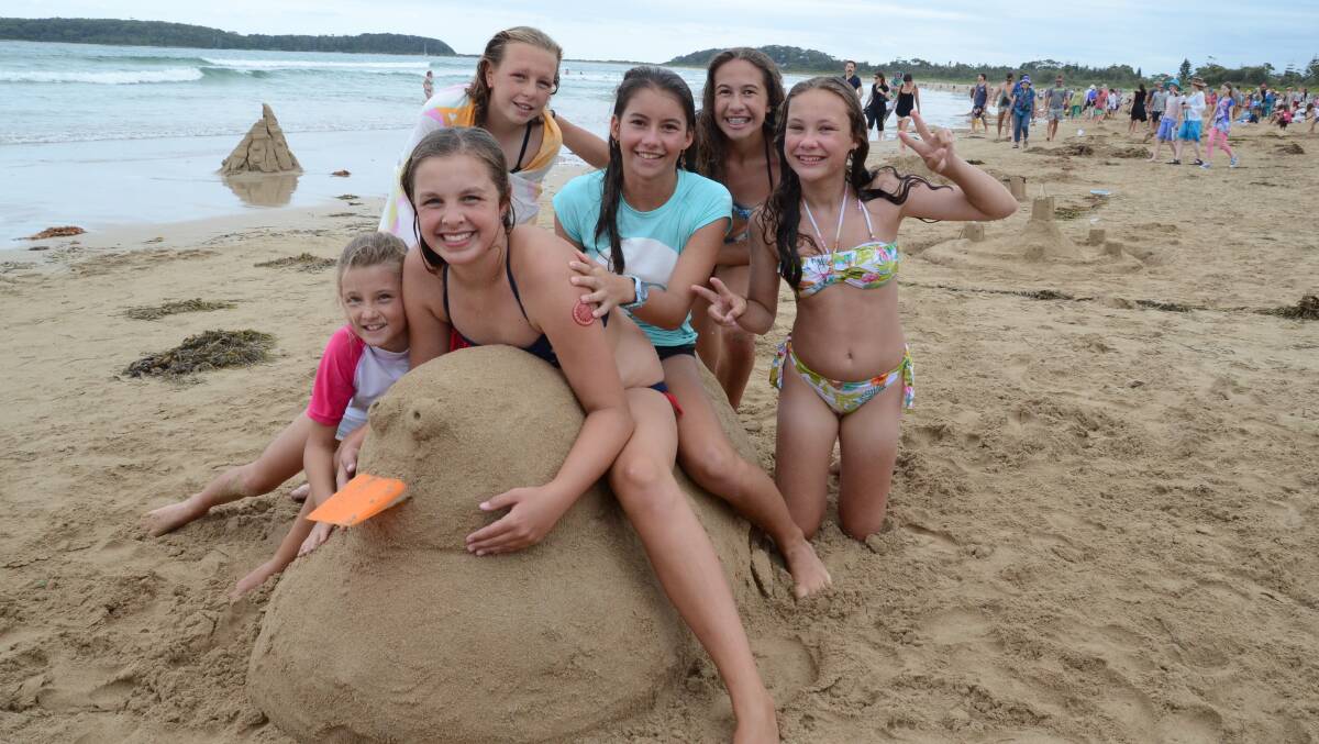 BROULEE: Libby Doughty of Mossy Point, Tehlia Beattie of Batehaven, Aymee Wise of Broulee, Rachelle Kelly of Canberra, Kayla Beattie of Batehaven and Marielle Kleusken of Canada had fun at the Broulee Sand Modelling and Sand Castle Competition on New Year's Eve. Their entry was called ‘Quackers’. 