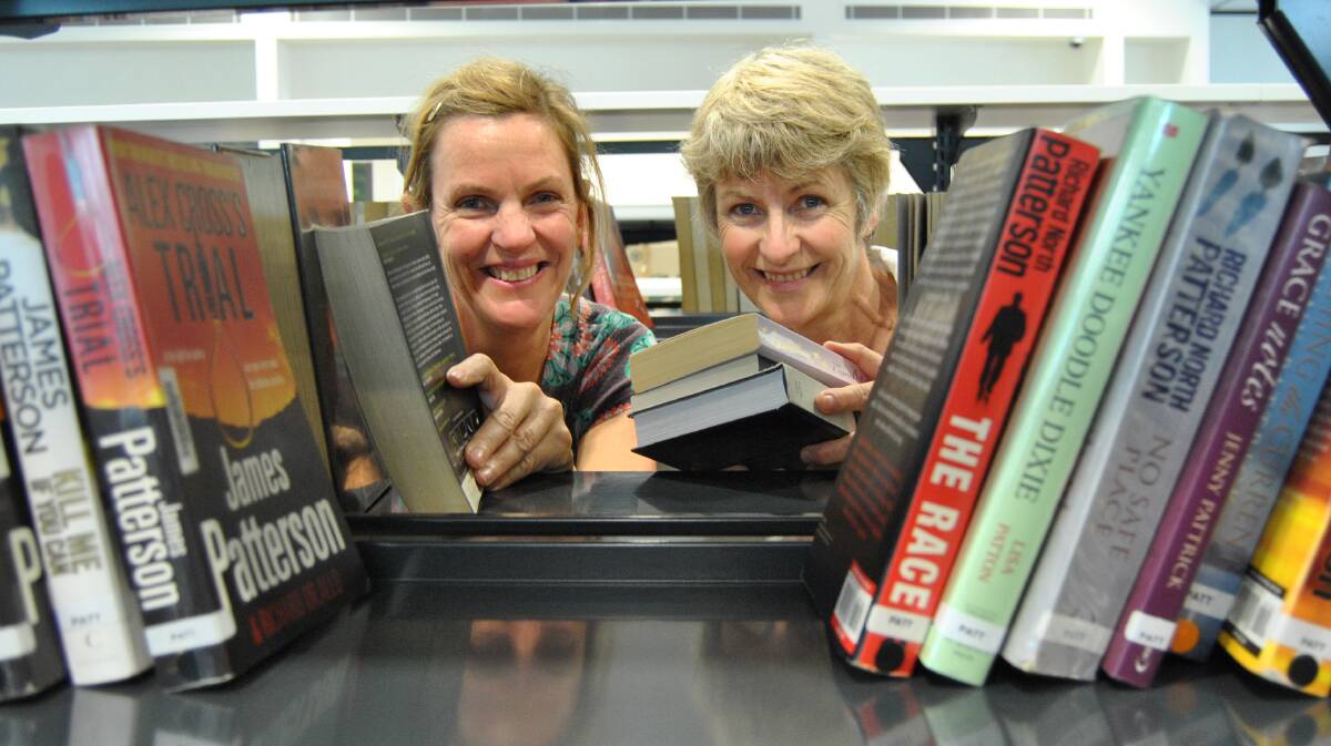  ULLADULLA: Ulladulla Library staff members staff Annabel Bomford (left) and Lynne Fricke spent last week packing 35,000 books on the shelves of the new facility, which is set to have double the number of books of the old library. 