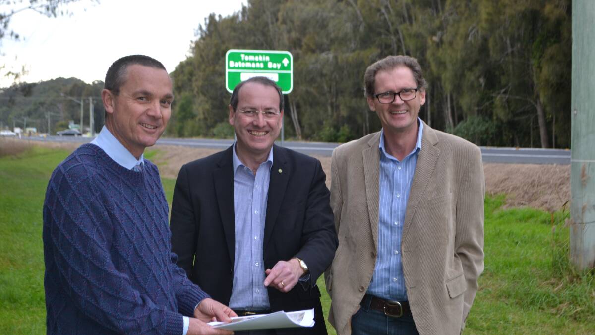 BLACK SPOTS: Eurobodalla Shire Council’s director of Infrastructure Warren Sharpe, Eden-Monaro MP Peter Hendy and mayor Lindsay Brown discuss plans for a footpath and island refuge on George Bass Drive at Tomakin. 