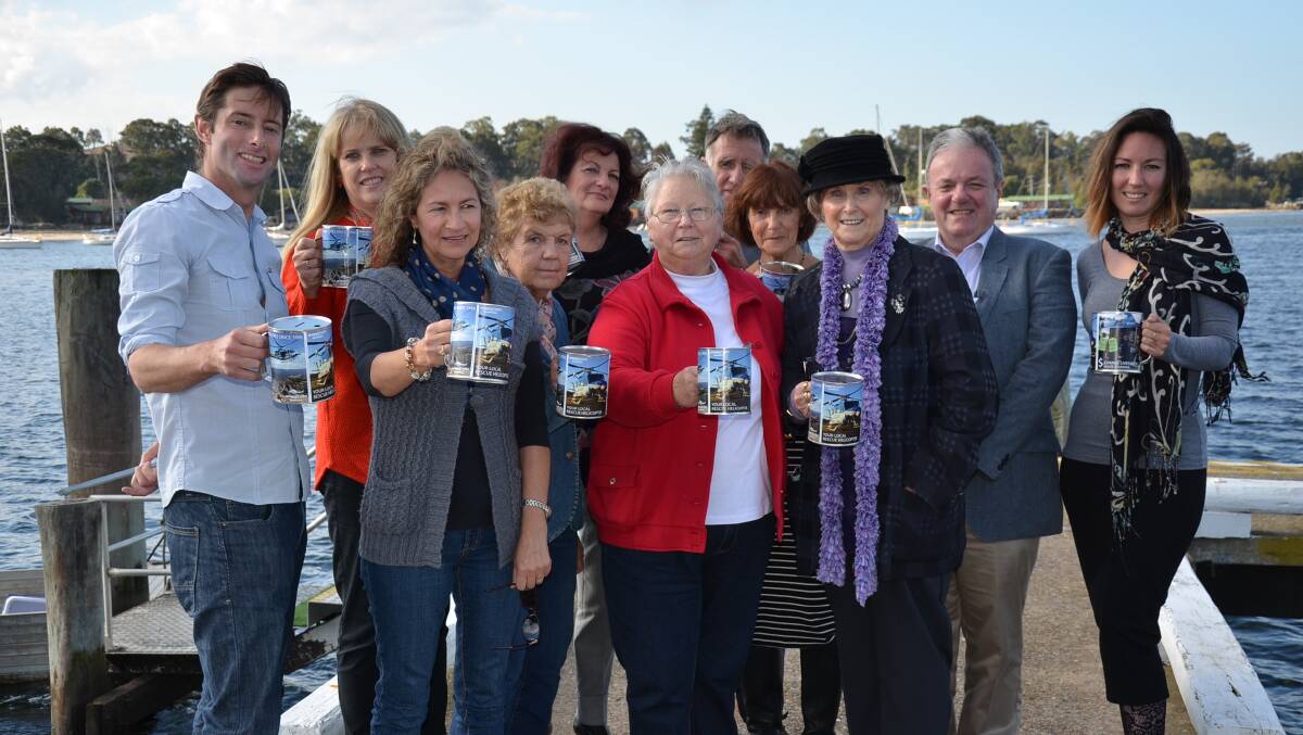 THANK YOU: Snowy Hydro South Care helicopter CEO Chris Kimball (left) thanked South Coast chapter
volunteers Christine Ralston, Dee Jones, Carole Withers Hill, Jackie Harding, Rhonda Porteous, Neil Burnside, Carolyn Harding, Cheyl Kenton and Steve Ralston in Batemans Bay on Monday. 