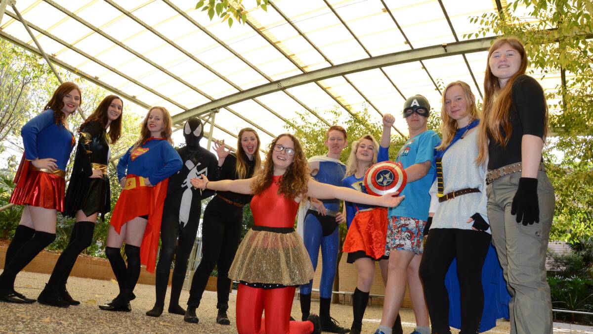 SUPERHEROES: Batemans Bay High School students Crystal Bennets, Sarah MacDougall, Chloe Austin, Joel Dunlop, Abbey Francis, Jesse Craven, Erin Warwick, Corey Thomas, Amy Bohlscheid, Brianna Bassett and front Tanika Golbach helped raise funds for Stop Hunger Now on Friday.