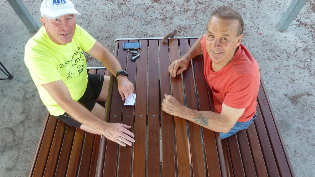 SPORTS CLOUT: Sports official Michael O’Mara and Geoff Fielding, of The Bay Push, discuss at Corrigans Reserve plans for a wheelchair race later this year.